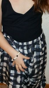 100% silk dress with stretchy top.